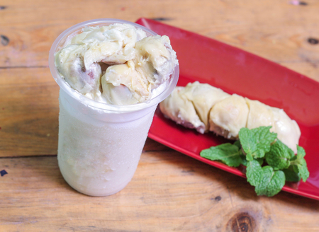 milkshake with durian pieces, in  plastic cup, delicious and fresh.の写真素材
