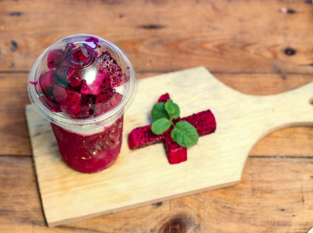 milkshake with guava pieces, in  plastic cup, delicious and fresh.の写真素材