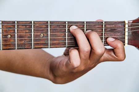 playing guitar, in chord C majorの写真素材