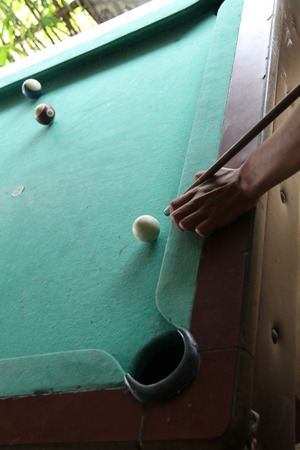 playing billiards