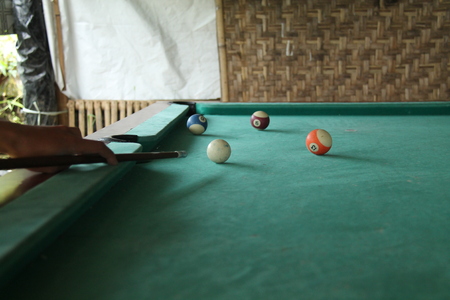 playing billiards