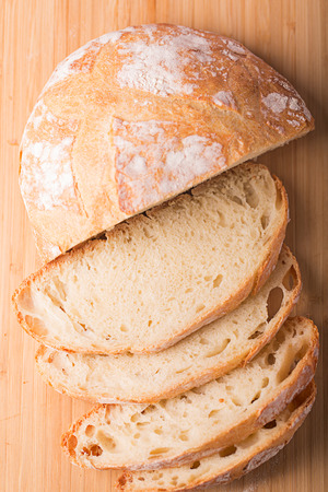Sliced bread on the cutting boardの写真素材