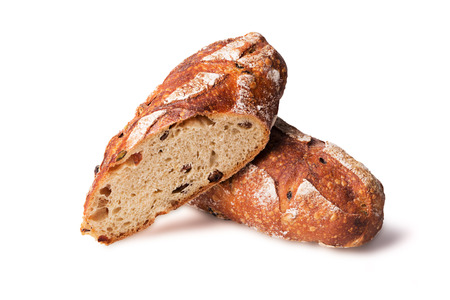Cereal bread with raisins isolated on white backgroundの写真素材