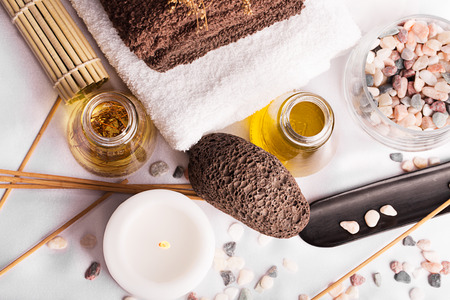 SPA still life: massage oil, towels,pebbles and herbs: massage oil, towels,pebbles and herbsの写真素材