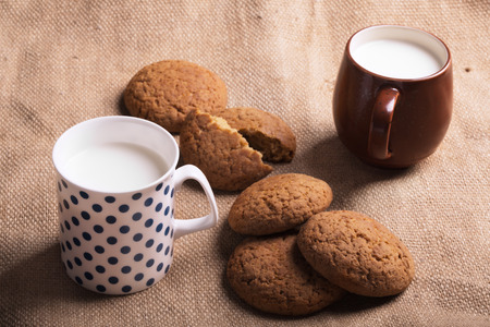 Oatmeal cookies and milk on the sackingの写真素材