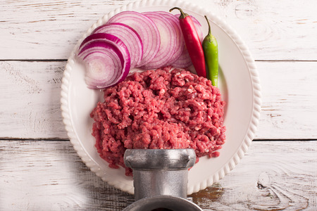 Mince on the plate with onion and chilli