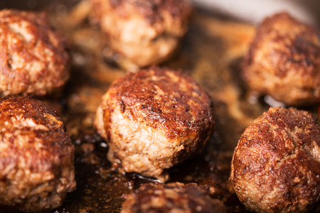 Fried meatballs on the pan (close up shot)の写真素材