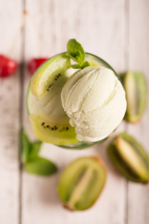 Tasty ice cream with kiwi and mintの写真素材