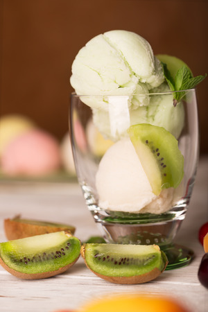 Tasty ice cream with kiwi and mintの写真素材