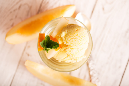 Tasty ice cream with melon and mintの写真素材