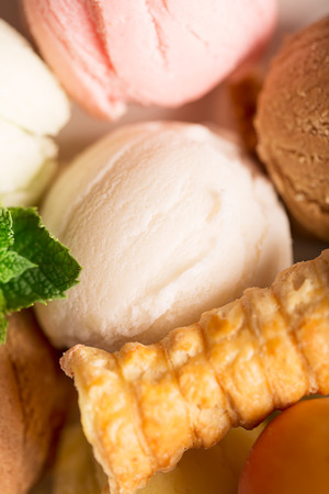 Multicolor ice cream balls with cakeの写真素材