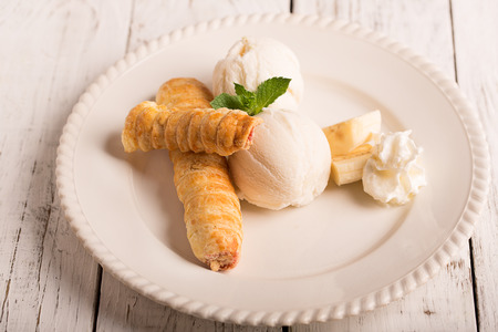 Tasty ice cream with crispy cakeの写真素材