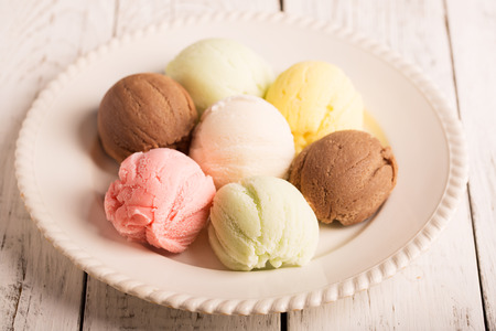 Multicolor ice cream balls on the plateの写真素材
