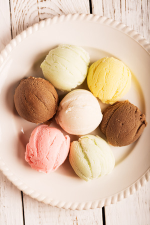 Multicolor ice cream balls on the plateの写真素材