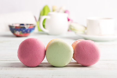 Macaroons on the wooden table (close up shot)の写真素材