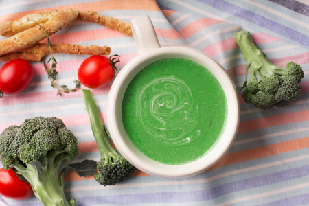 Vegetarian broccoli green soup puree with creamの写真素材