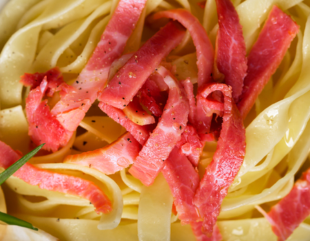 Pasta Carbonara with pancetta, mushrooms and sauceの写真素材