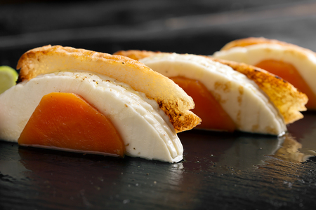 Sandwiches with cheese, boiled carrots and radishesの写真素材