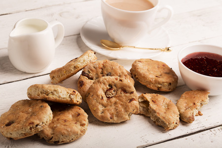 Baked English biscuits for Devonshire tea with milkの写真素材
