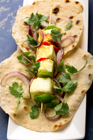 Indian paneer curd cheese fried with vegetablesの写真素材