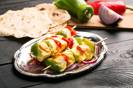 Indian paneer curd cheese fried with vegetablesの写真素材