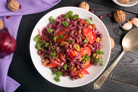 Red beans fried with onions, tomatoes and walnutsの写真素材