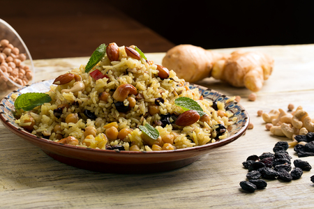 Traditional Middle Eastern or Indian dish of rice (pilaf) cooked with spicesの写真素材