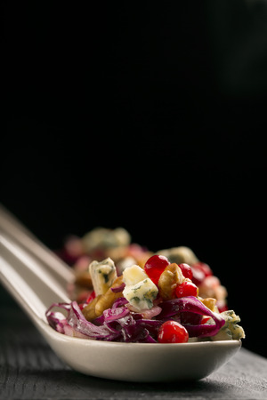 Vegetable salad of cabbage with walnuts and cheeseの写真素材