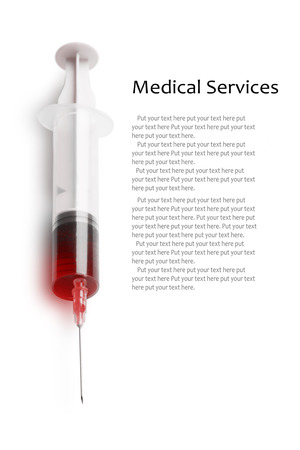 Syringe with blood isolated on white backgroundの写真素材