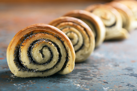Delicious twisted baked buns with poppy seedsの写真素材