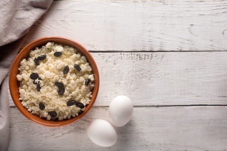 Cottage cheese with raisins and eggsの写真素材
