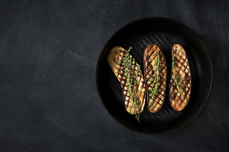 Grilled eggplants with thyme on the grill panの写真素材