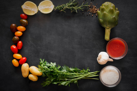 Mediterranean food vegetables and sauces on the chalkboard. Top viewの写真素材