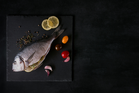 Mediterranean fish - dorado and vegetables, lemonの写真素材