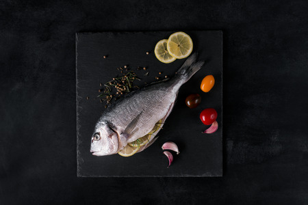 Mediterranean fish - dorado and vegetablesの写真素材