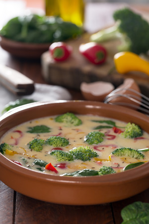 Fresh omelette prepared with vegetables and spinach. Side viewの写真素材