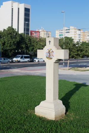Cross on the street in the city of Alicanteの写真素材