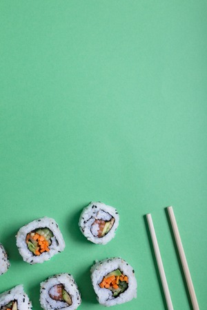 Japanese sushi usually prepared with rice, fish salmon or eel and vegetables. Copy space for designersの写真素材