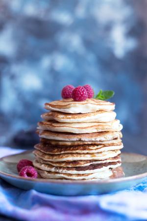Pancakes with berries and honey. Copy spaceの写真素材