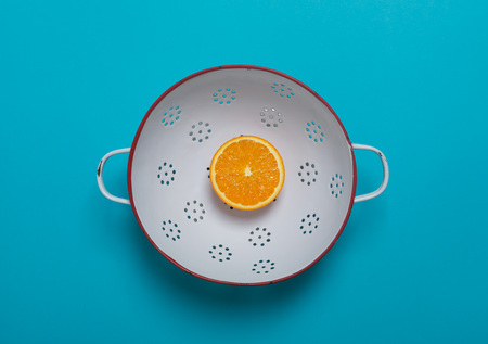 Fresh oranges on the blue background. Top viewの写真素材