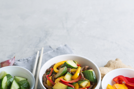 Traditional Asian stir fry salad contains meat and vegetables. Seasoned with soy sauce. Copy space for the textsの写真素材