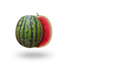 Cutted watermelon isolated on white background with a shadow, horizontalの写真素材