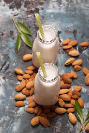 Almond milk on a turquoise backgroundの写真素材