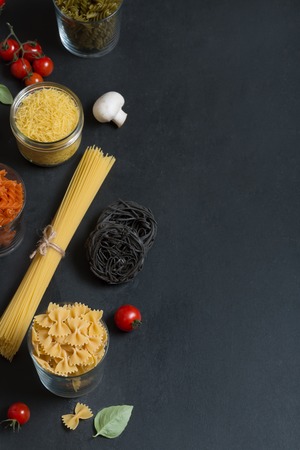 To cook great italian pasta with sauce take any kind of pasta and some vegetables such as tomatoes or mushroomsの写真素材