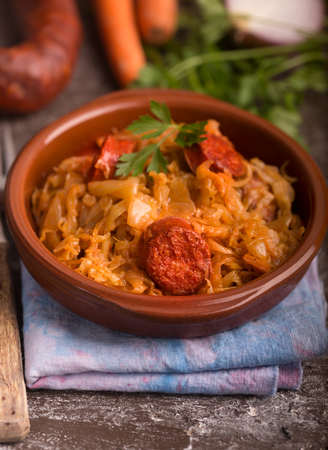 Bigos, a traditional Polish dish with cabbage on brownの写真素材
