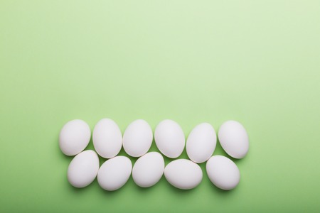 White eggs on the green