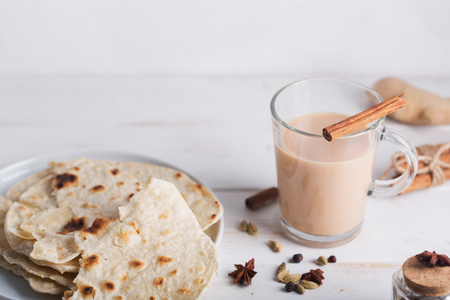Flavoured tea chai made by brewing black tea with aromatic spices and herbsの写真素材