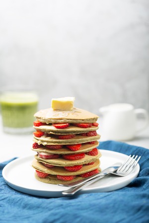 Sweet Homemade Pancakes with strawberries. This delicious pastry is included in the menu of cafes and restaurants around the world. Traditional North American dish, popular in both the USA and Canadaの写真素材