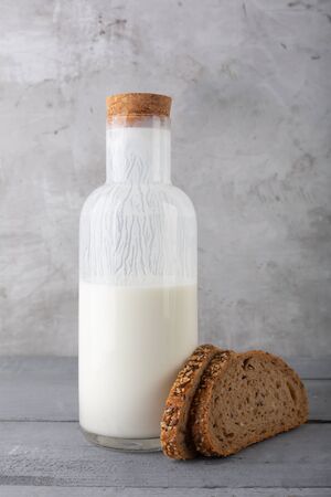 Kefir drink with raspberry on the gray backgroundの写真素材