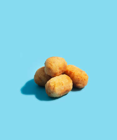 Tapas croquettes, traditional Spanish or French snack usually prepared with mashed potatoes, meat or...